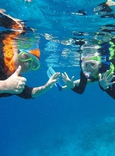 經典半日出海行程(雙環礁浮潛點/活動午餐)→返回島上自由散策→酒店內享用晚餐